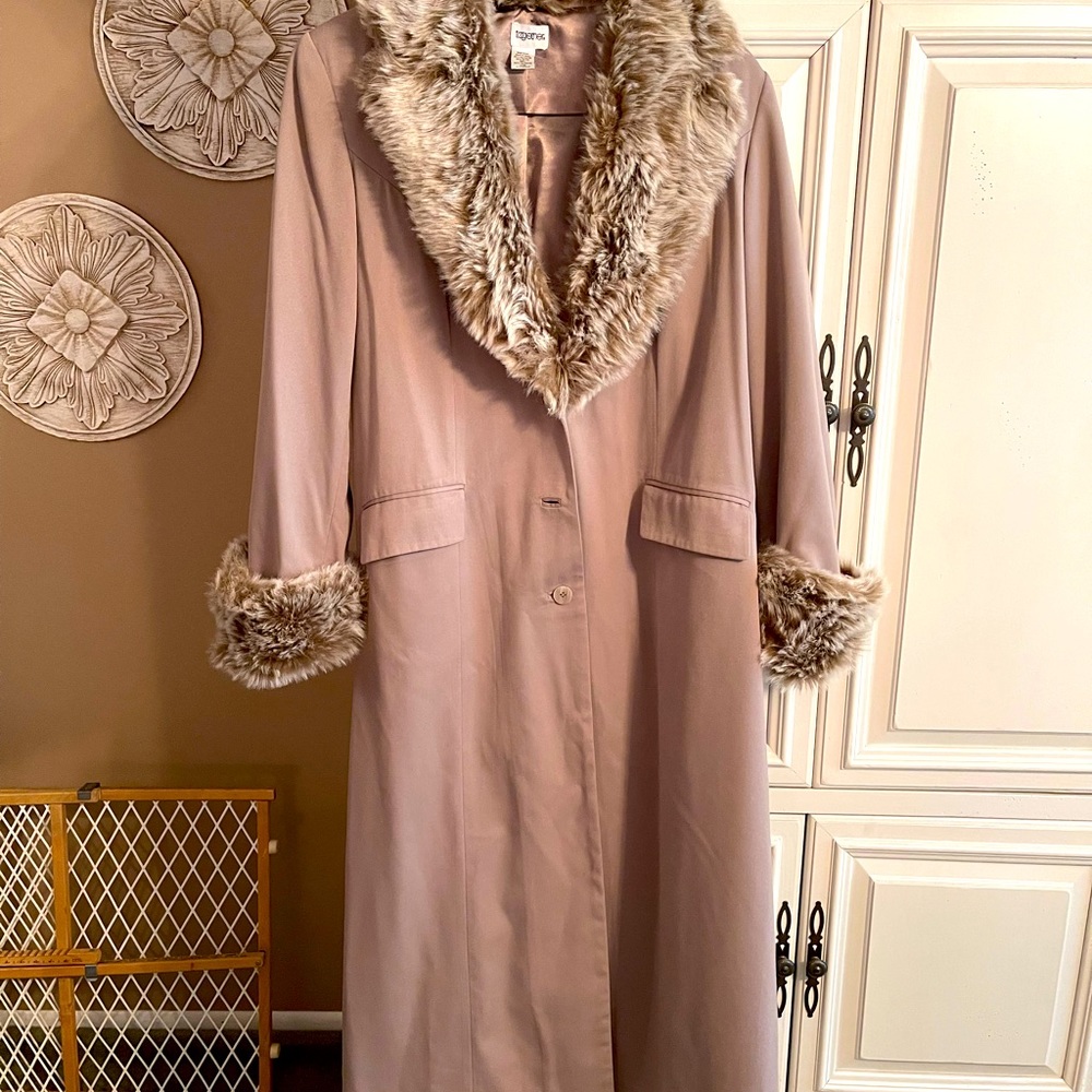 Beautiful maxi length rain coat with back detail.